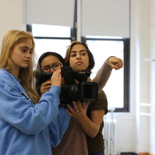 students filming